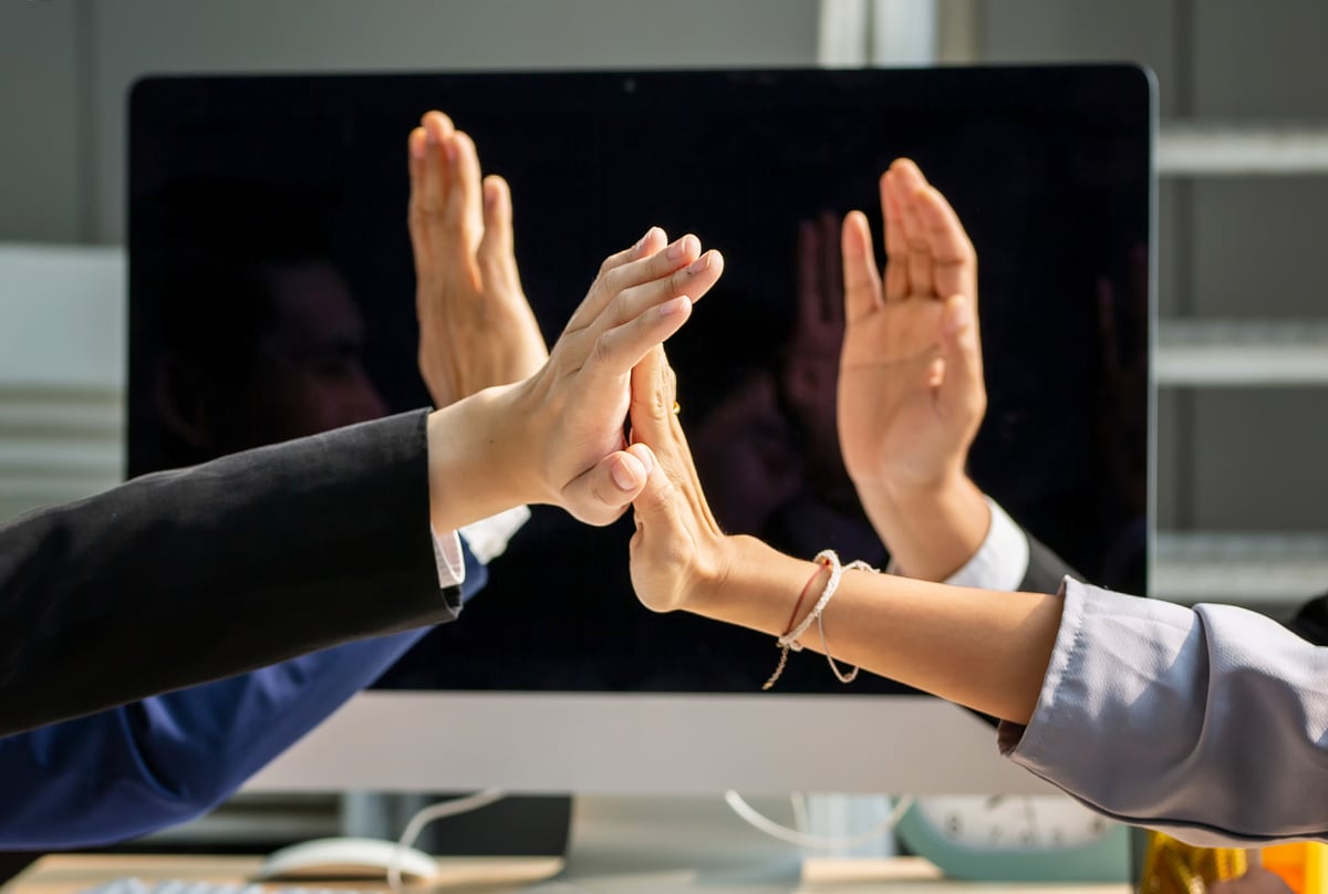 Midsection Of  Business People Hands  Hi-Five